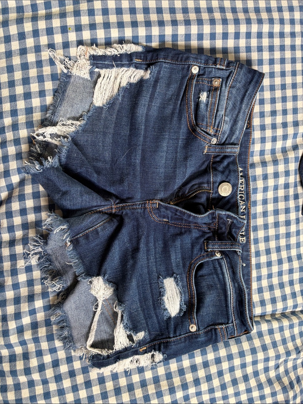 Distressed Dark Blue Denim Cutoff Shorts